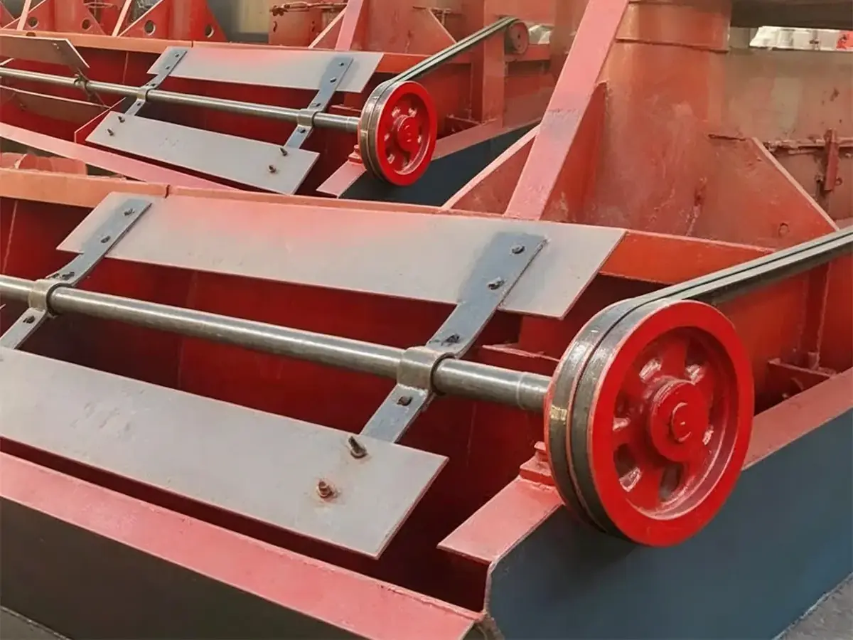 Scraper shaft, scraper blades, and pulley assembly